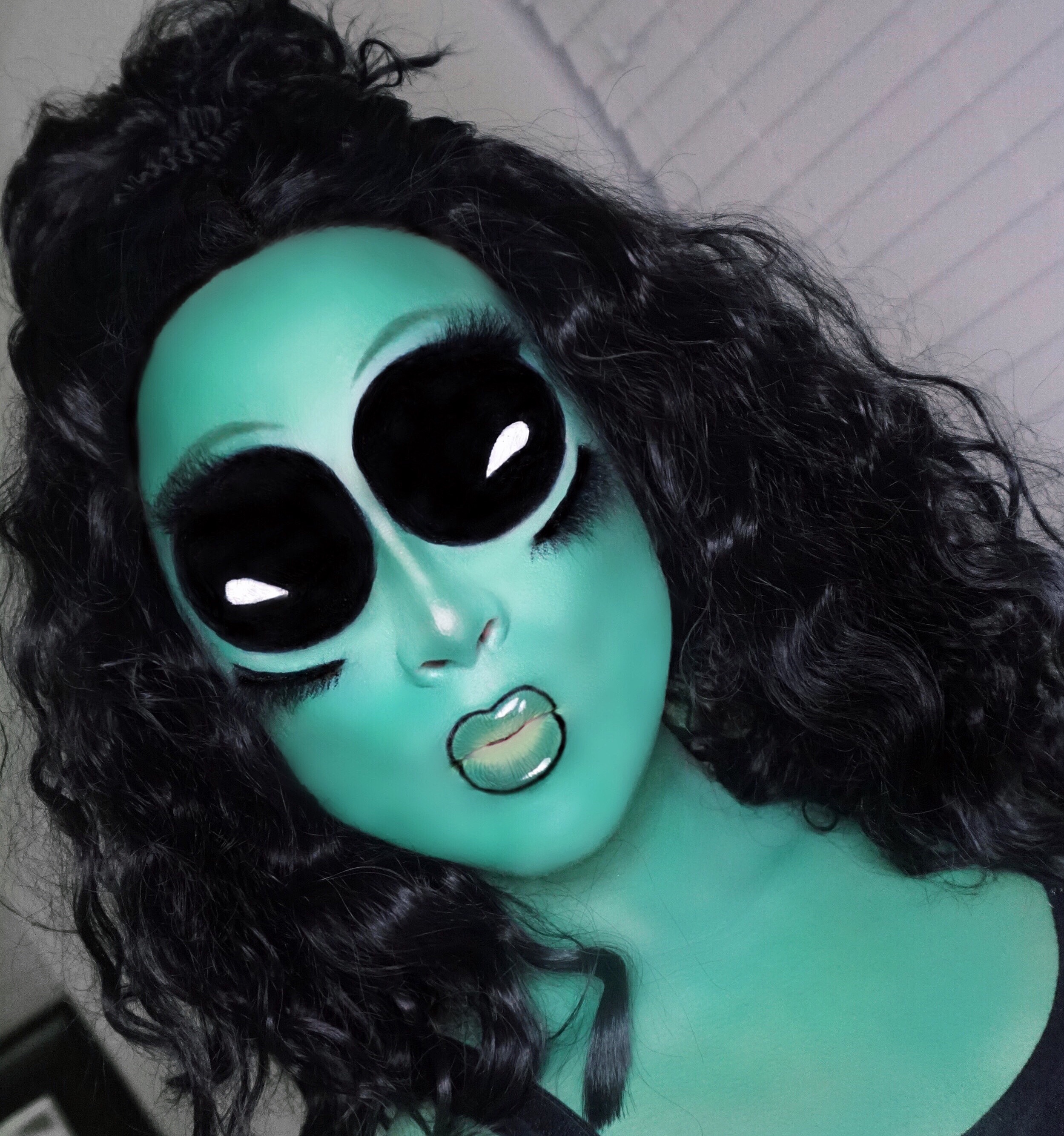 image of woman with alien Halloween makeup